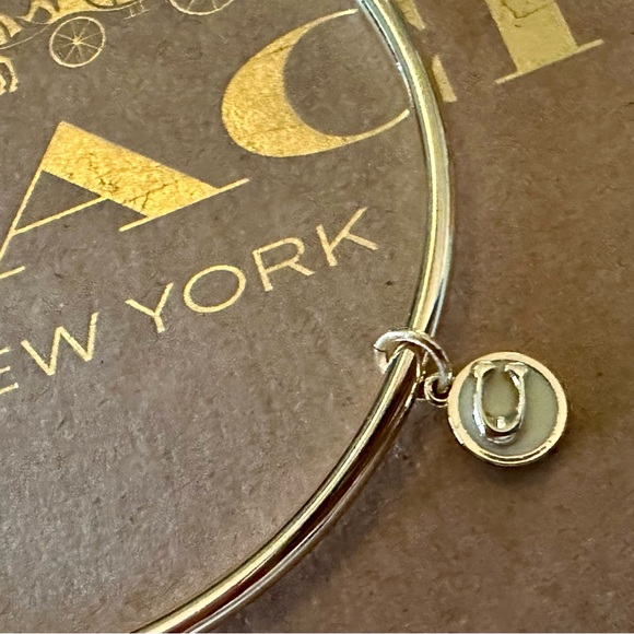 Coach Gold-tone Skinny Bangle Bracelet with White Enamel Signature C Charm - Picture 2 of 6